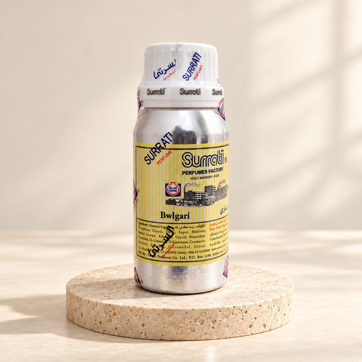 Surrati Bwlgari – Travertine Studio Surrati Bwlgari perfume oil bottle on a pale travertine pedestal