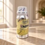 Surrati Bwlgari perfume oil bottle on cream stone in soft window daylight